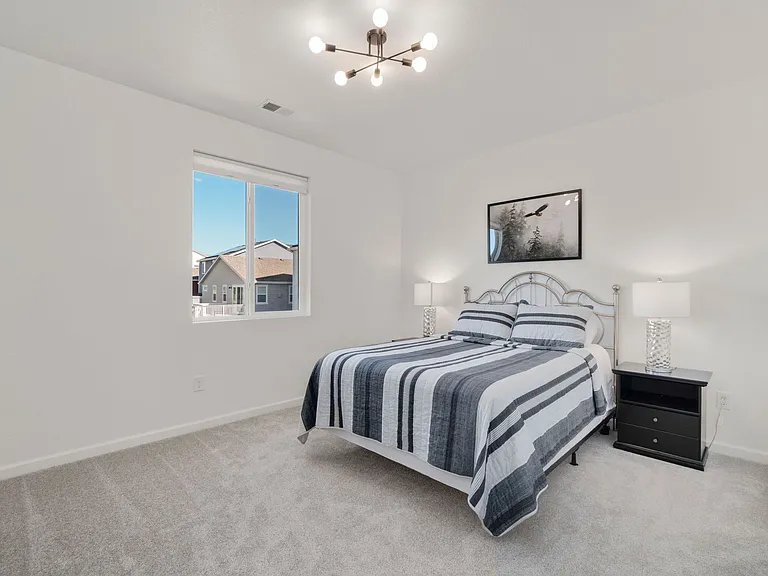 Bedroom w/ Queen Sized Bed on Upper Floor