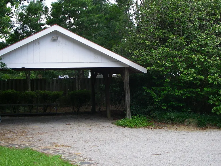 Another view of detached carport.