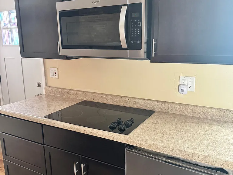 Microwave and glass cooktop
