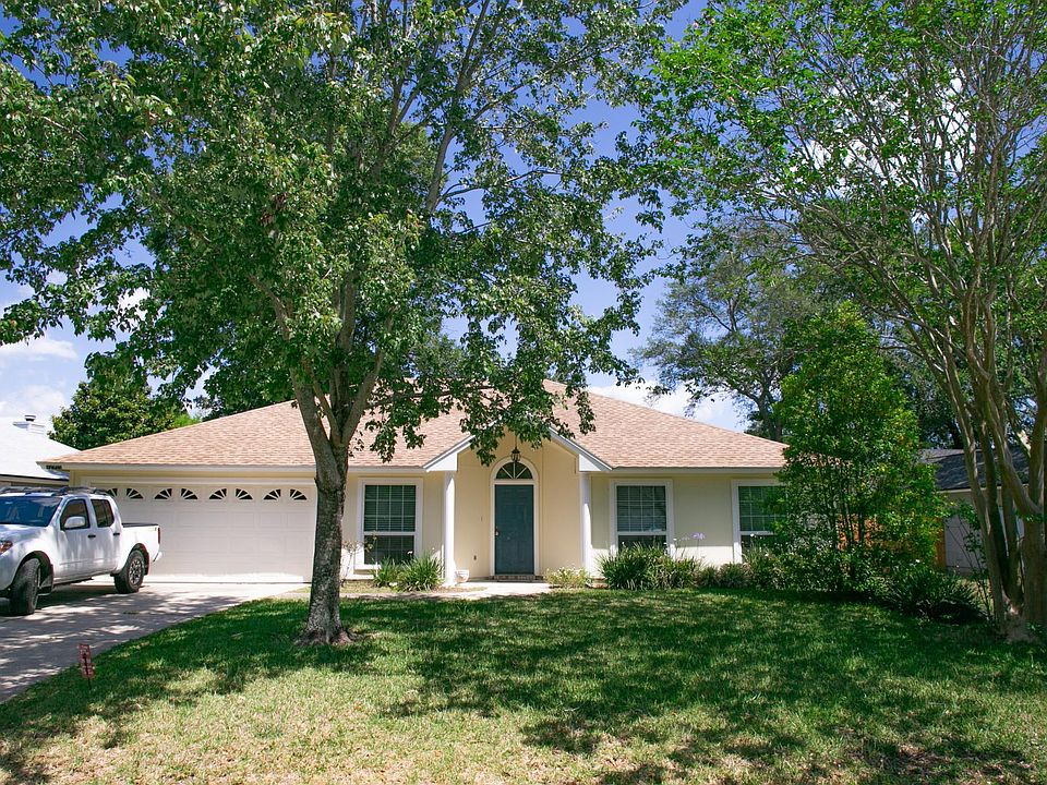 Front of house with beautiful shade trees