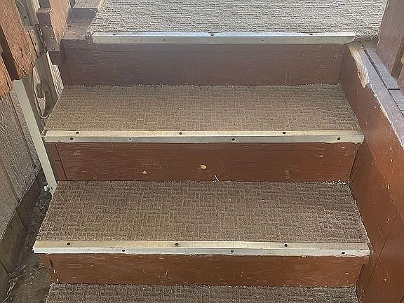 stairs to deck with gate