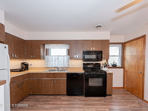 5th image of 6459 N Nordica Ave