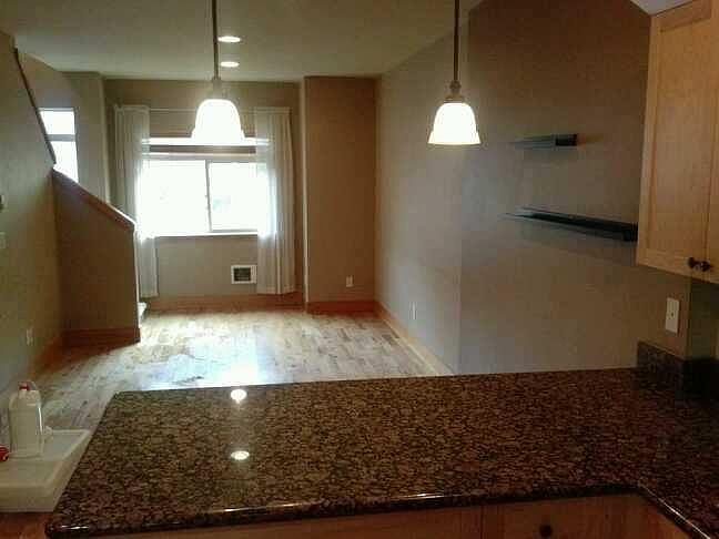 Living / Dining Area. Window to Back Yard