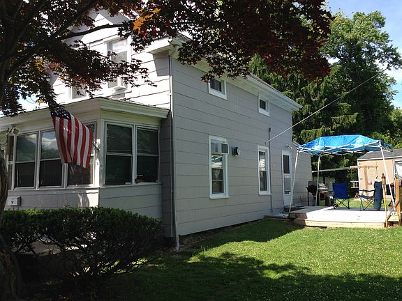 porch in front, deck at side