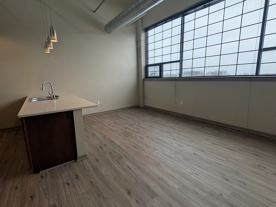 Type 6 living area with large windows and natural light