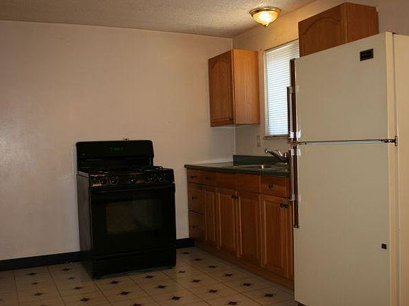 Large kitchen with full size refridge and