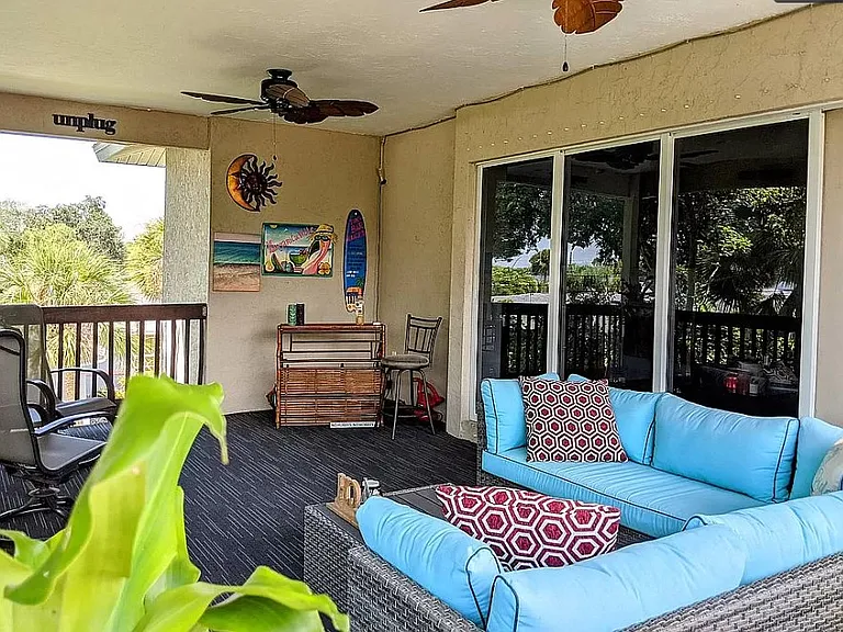 Upstairs balcony boasts 13' x 22' of outdoor living space. Open the three recessed sliders to double your living space upstairs