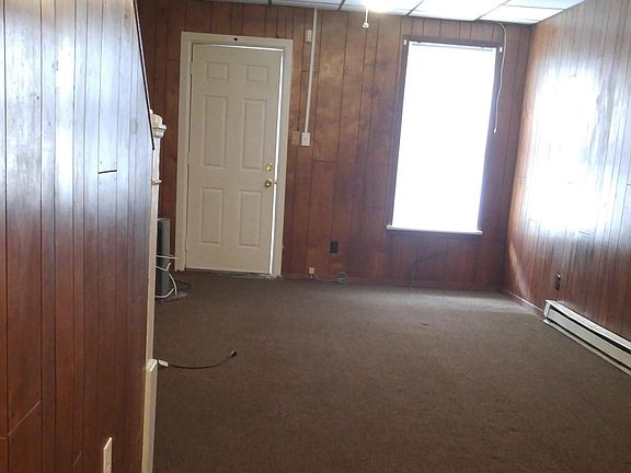 Front entrance - new flooring is about to be laid... This carpet is no longer on the floor...