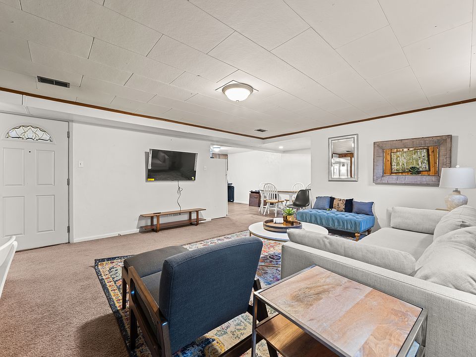 Private entrance to garden level unit. Enter into the open living area.