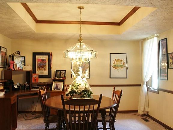 Formal dining room with tray ceiling
