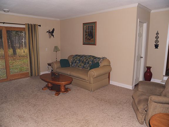 Living room with walkout to acreage,