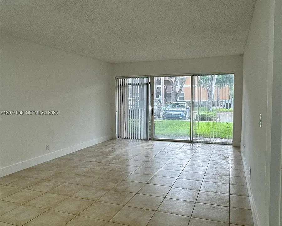 8801 Wiles Rd #103