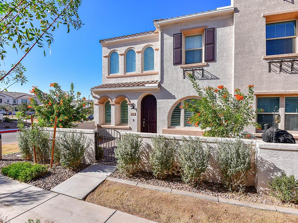 Arched Spanish architecture and stone paved courtyard, with views of the park, and guest parking near by,