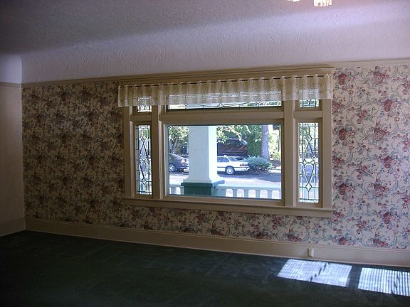 Living rm front window with lead sides