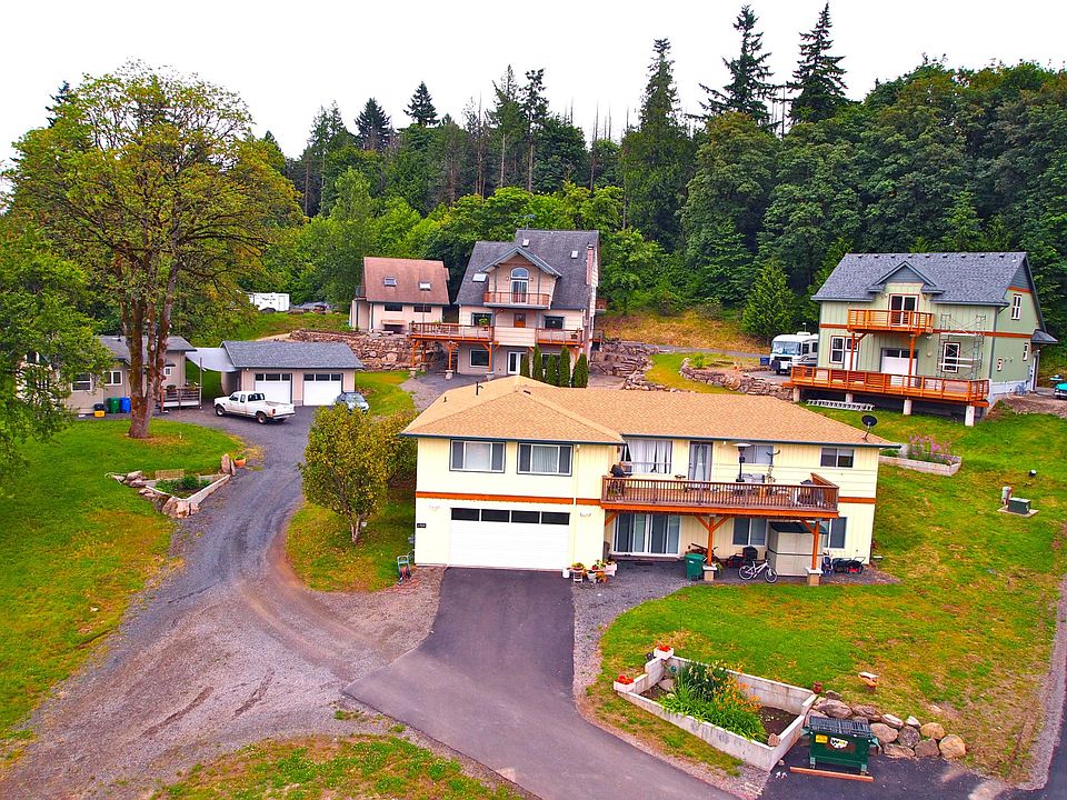 Neighborhood. No through roads. Landlord lives in beige house above.