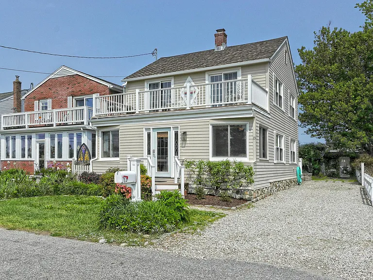 Exterior front with view of driveway.