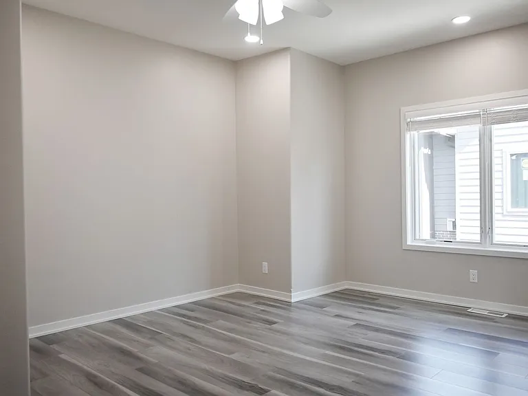 Large bedroom with great natural lighting at Lyric Townhomes.