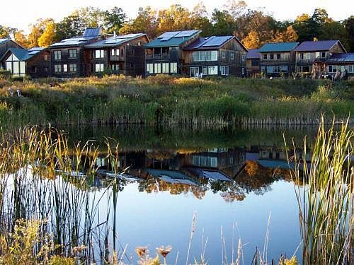 view of homes from pond