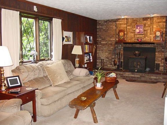 Sunken Family Room w/brick hearth & wet bar