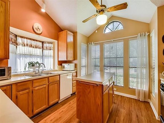 Large island kitchen with high ceilings