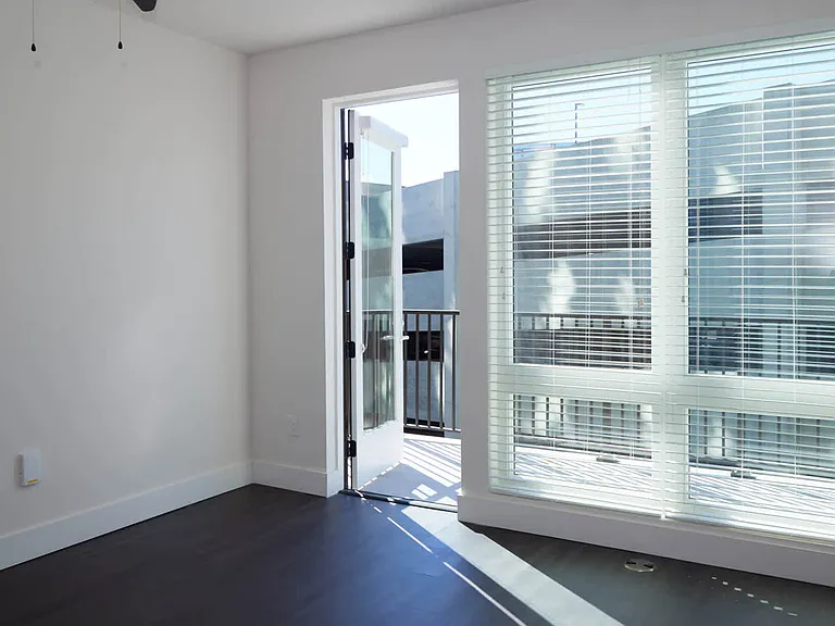 Living Room with Balcony and Hard Surface Flooring