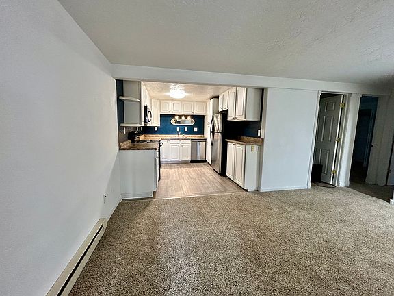 Living room looking into kitchen