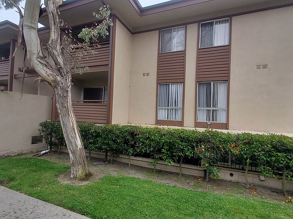 We'e the lower unit. It's on a corner which provides sunlight on two sides of the main bedroom.