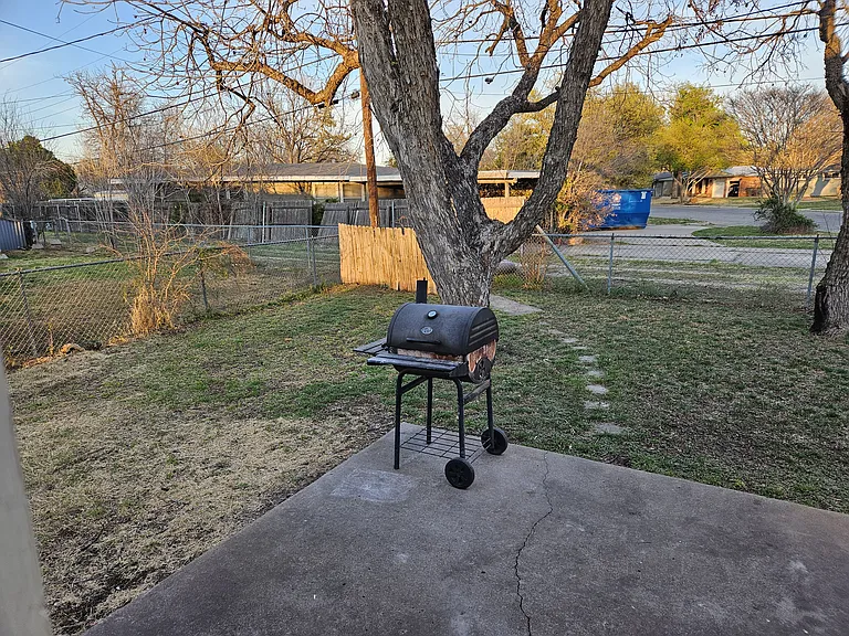 Back alley and only neighbors on the left. Big yard in the back and even more front yard. Big lot