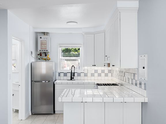 Kitchen with seating area bar