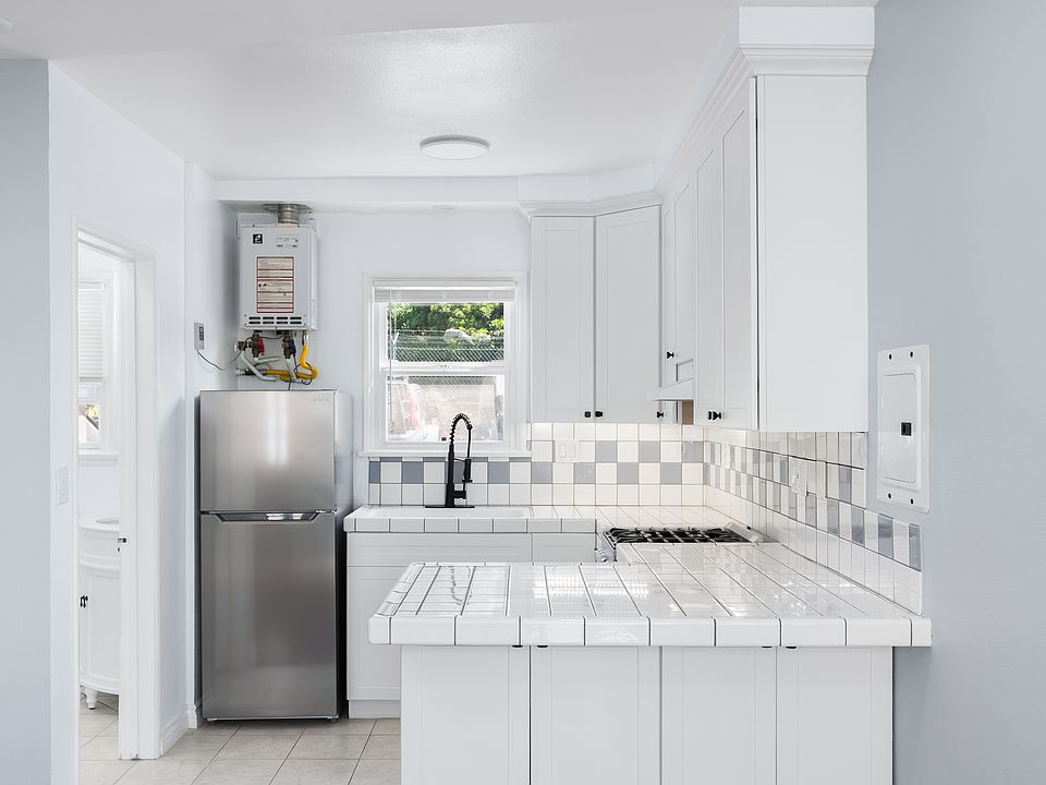 Kitchen with seating area bar
