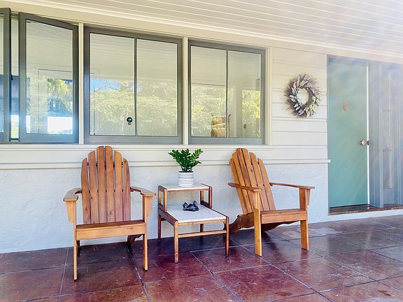Protected and shaded front porch.