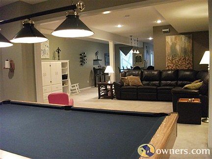 Finished basement with pool table and media lounge