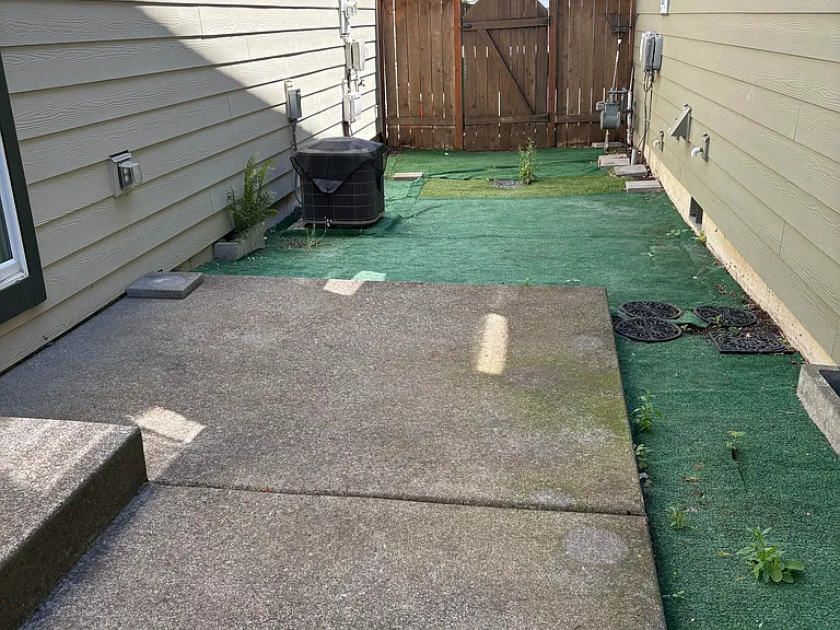 Patio on side, turf to control weeds, willing to discuss improvements