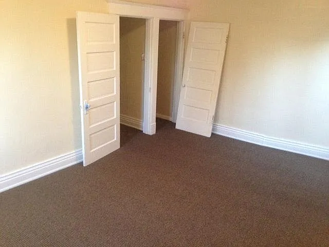 Bedroom view towards hall and closet