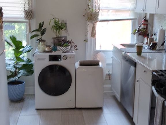Kitchen with laundry unit