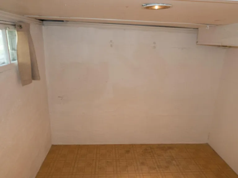 Basement room in the Northeast corner of the basement.