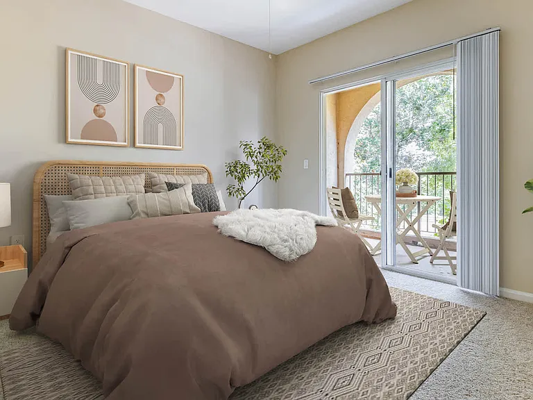 Carpeted Bedroom with Balcony