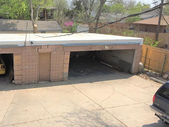 The unit comes with its own two-car garage.