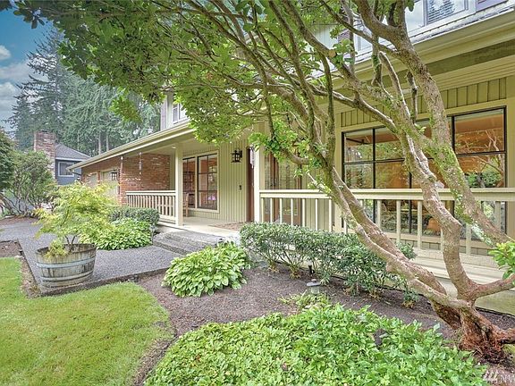 Enjoy your morning coffee on this lovely, covered front porch.