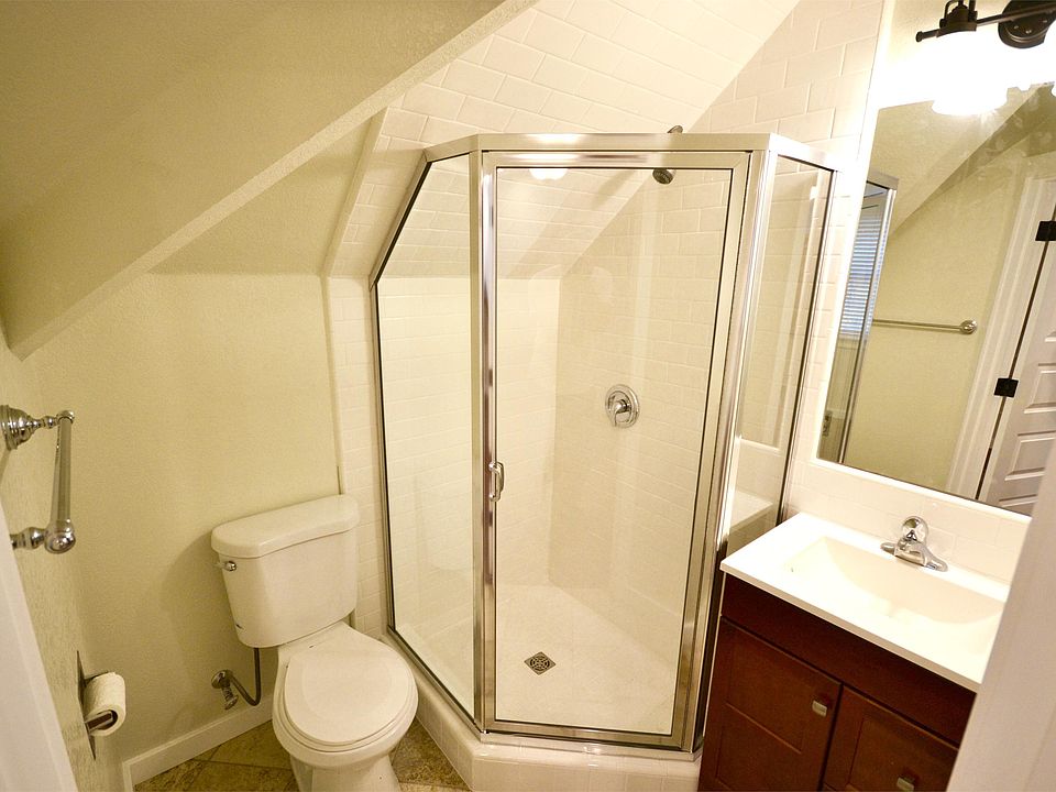 Tankless water heater, shampoo dispenser, iron, hair dryer, towels, bath mat...everything you need
