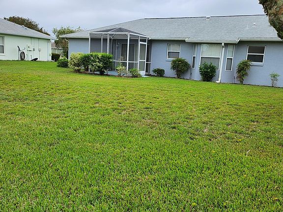 Back of house with screened area