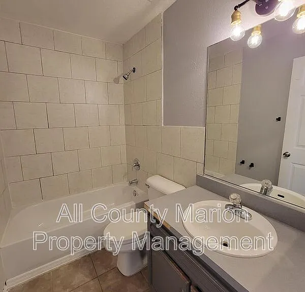 710 NE 26th St — Photo 12