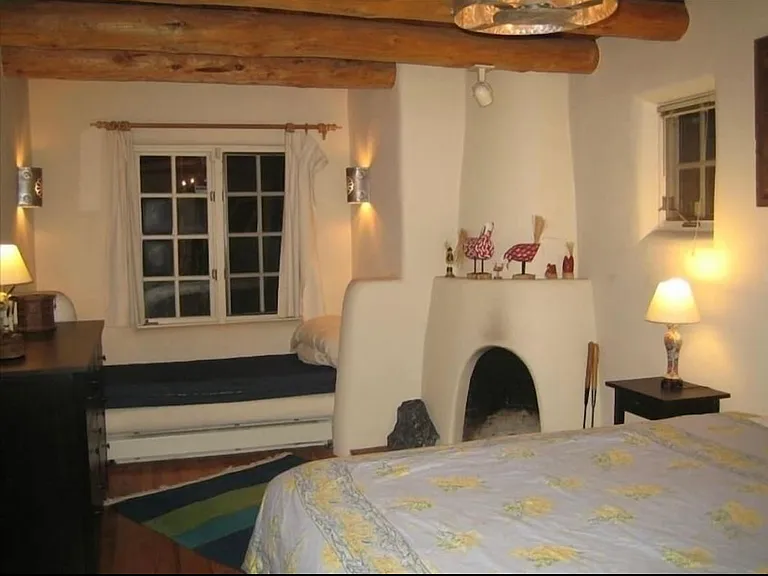 Master bedroom with king bed and single bed under window_perfect for reading.