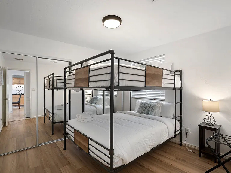 5th bedroom, two queen sized bunk beds