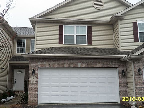 2 car large garage with built in tool area and shelves for storage
