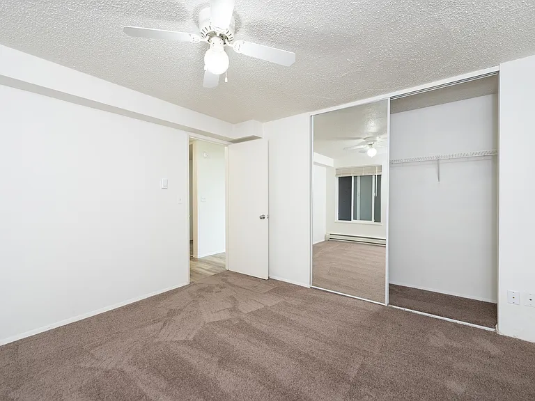 Comfortable Tacoma bedroom with a ceiling fan and oversized closet. Comfortable Tacoma bedroom with a ceiling fan and oversized closet.