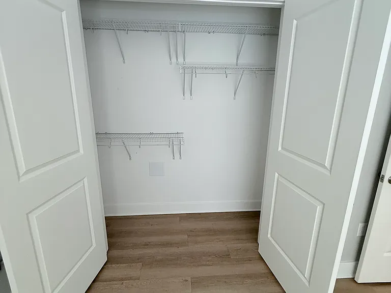 Double closet in bedroom