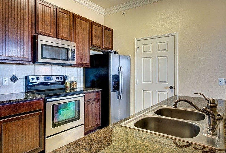 Stainless steel appliances, granite countertops