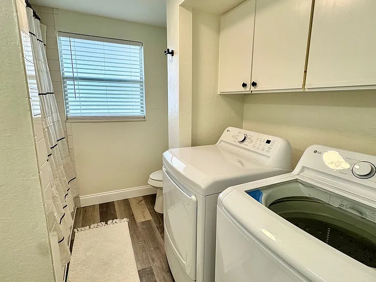 Bathroom, with laundry in unit
