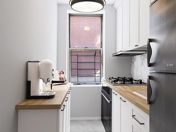 5th image of 185 W Houston St APT 1C